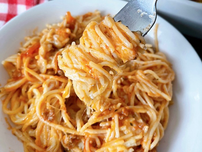 Baked spaghetti recipe with alfredo and marinara sauce